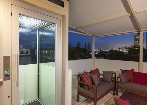 rooftop elevator top hat glass tower