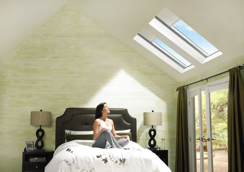 woman sunlit under skylight