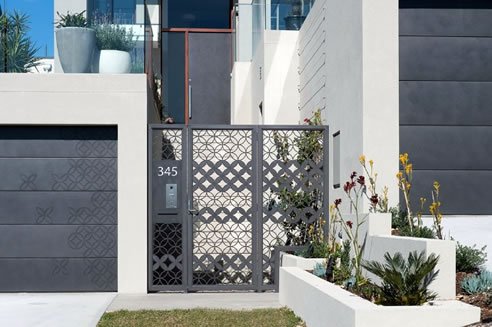 bespoke patterned front gate and garage door