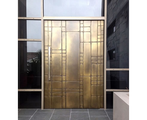 brass florentine carved entry door