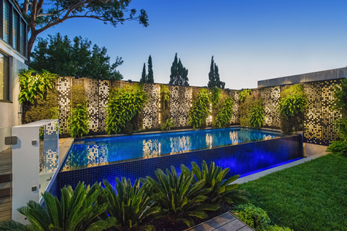 green wall pool surround