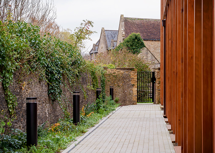 Modern Bollard Illumination for Historical School by WE-EF