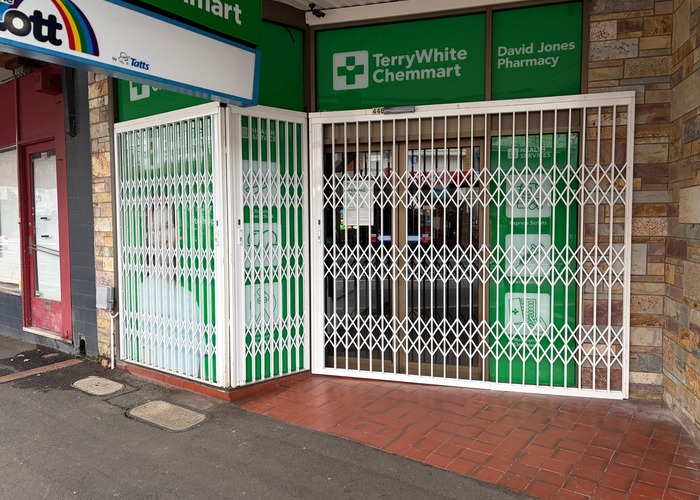 Retractable Stylish Security Doors for Pharmacy Shopfronts by ATDC