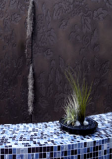 Floral wall in aged bronze