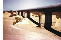 concrete chairs supporting water pipeline