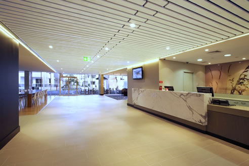 supaslat ceiling panels in hotel foyer