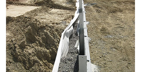 concrete retaining wall sleeper system