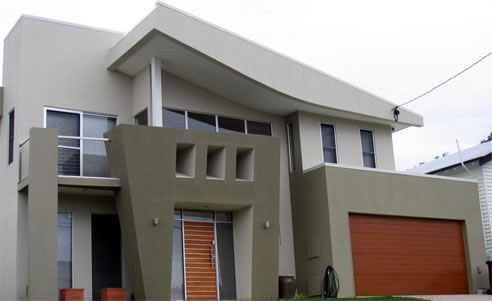 rendered polystyrene clad house