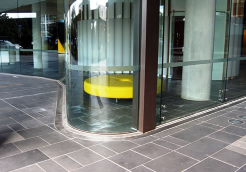 unbroken curved linear drainage grate