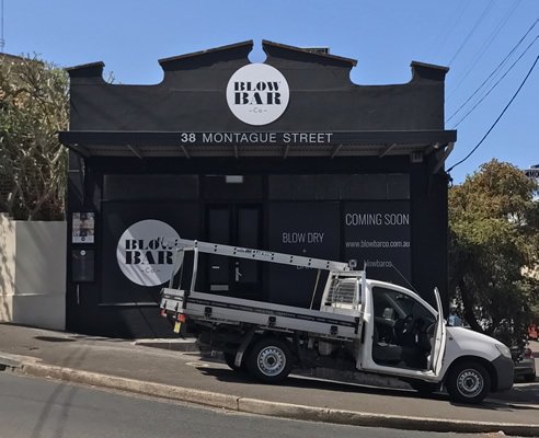 high contrast shopfront signage