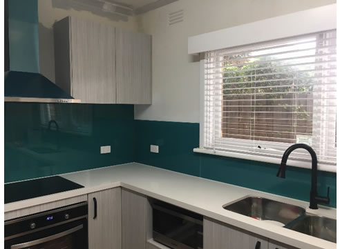 Teal Acrylic splashbacks in kitchen