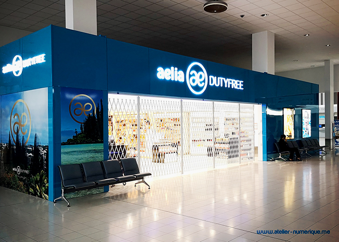 Folding Security Shutters for Airport Duty-Free from Trellis Door Co