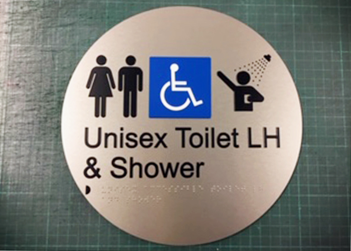 Ambulant Toilet Signs with Tactile Text and Symbols by Hillmont Braille Signs