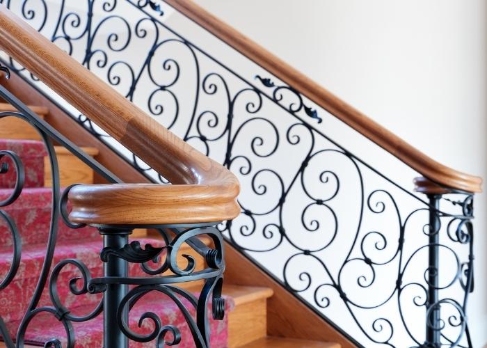 Classic Staircase with Wrought Iron Balustrade by S&A Stairs