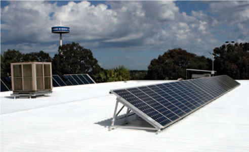roof with solar reflective paint coating