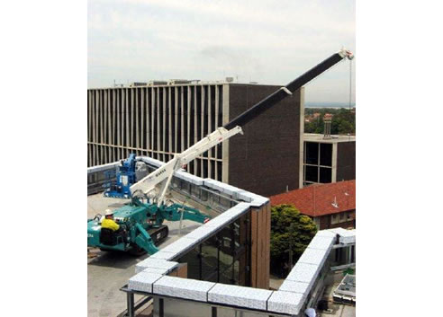 mini crawler crane on rooftop