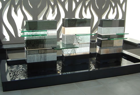 glass and stone water fountain