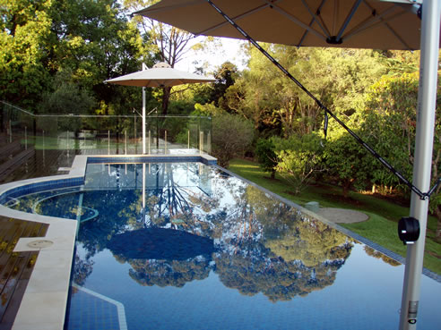 cantilevered swimming pool umbrellas