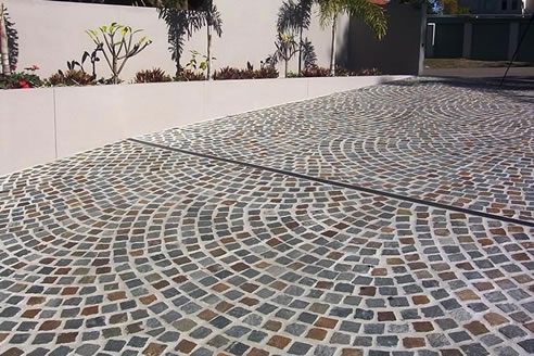 patterned porphyry stone driveway