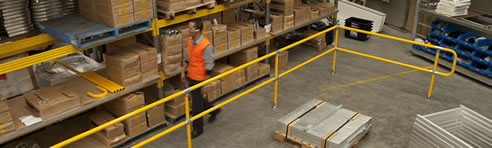 yellow safety barriers in factory
