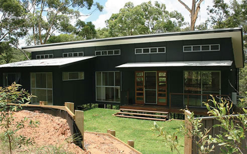 roof with insulated roofing panels