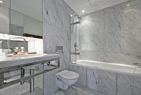 white marble tiled bathroom