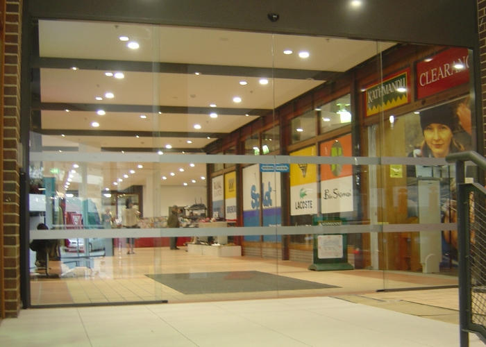 Automatic Frameless Sliding Doors for Commercial Establishments by ADIS